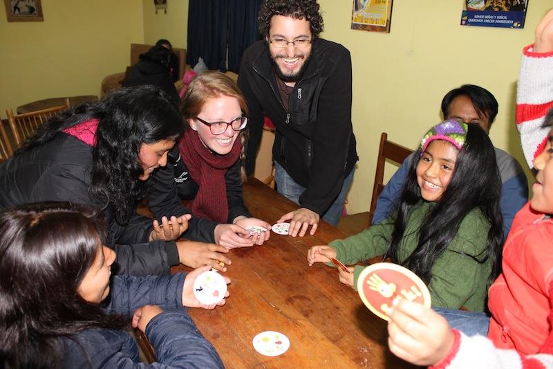 Volunteers with friends in Peru. Volunteer Abroad Profile: Jesuit Volunteer Corps International | Intentional Travelers