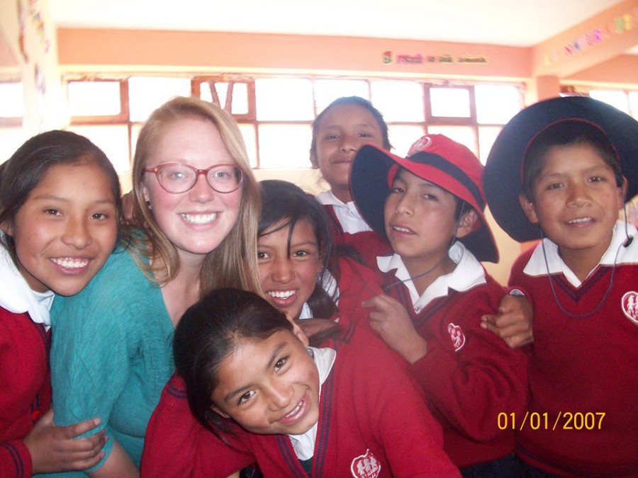 JVCI volunteer with students in Peru. Volunteer Abroad Profile: Jesuit Volunteer Corps International | Intentional Travelers
