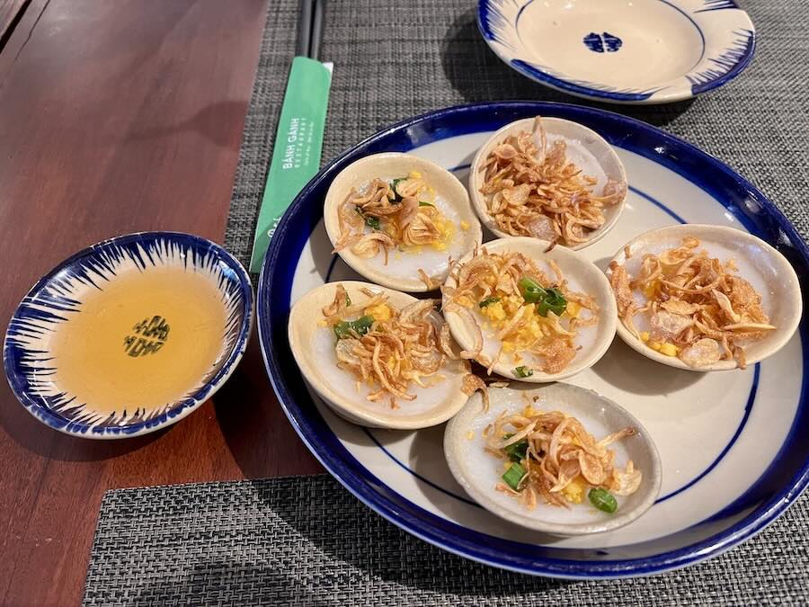 mini dishes of banh beo, side of fish sauce