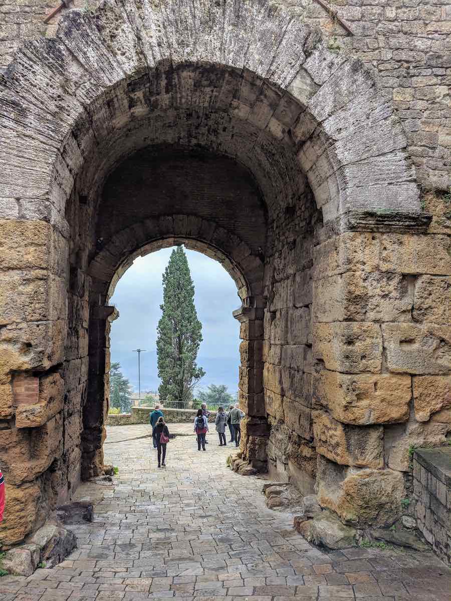 arched stone entrance to Volterra, Tuscany