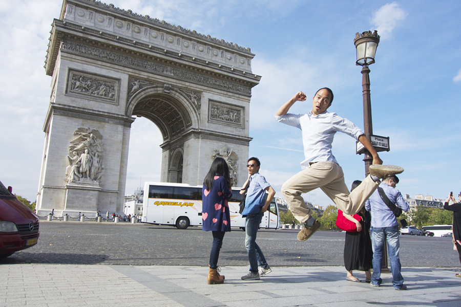 Jumping Jedd, Arc de Triomphe, Paris | Intentional Travelers