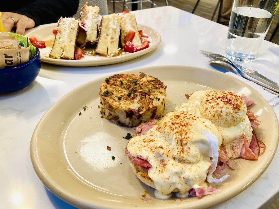 eggs benedict, hashbrowns, french toast with mascarpone and strawberries