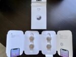 Apple Air Tags packaging - luggage tracker device | Intentional Travelers