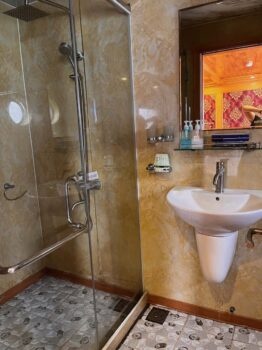 shower and sink bathroom on Venezia Cruise boat