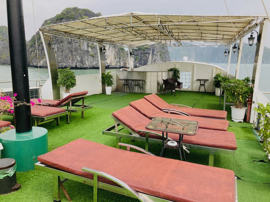 rooftop deck and sun chairs in Halong Bay
