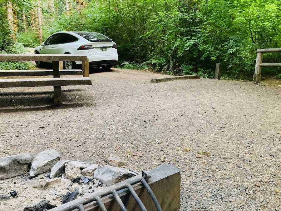 campsite with Tesla in background