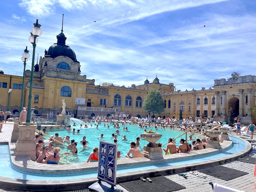 thermal baths pool and yellow buildings